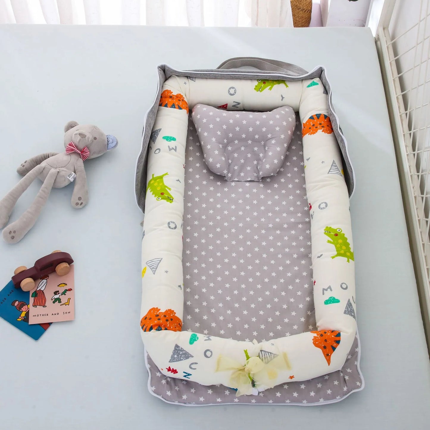 Cama de bebé plegable,
