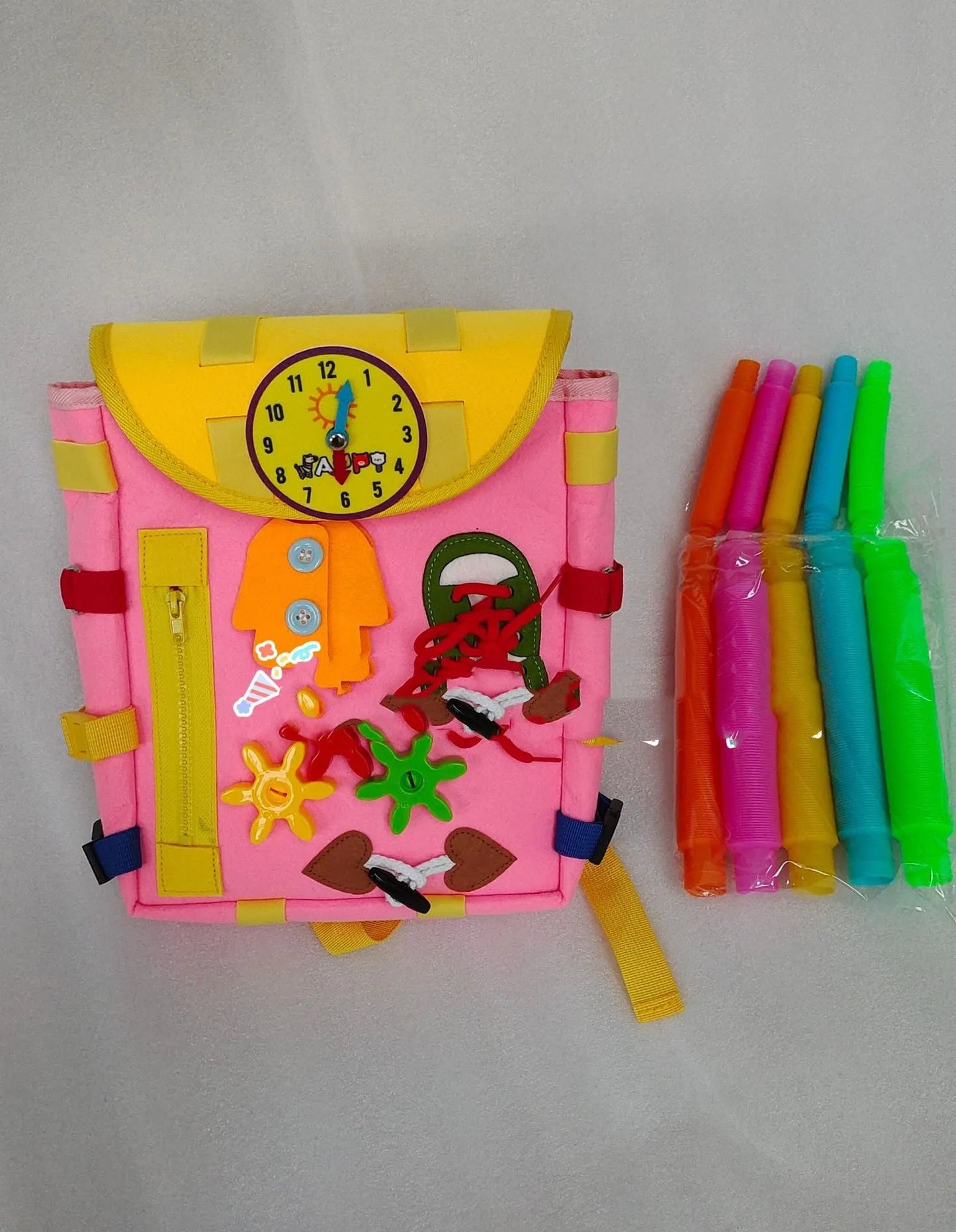 Sac à dos avec boucles et jouets d'activité d'apprentissage pour les tout-petits développent des compétences de base