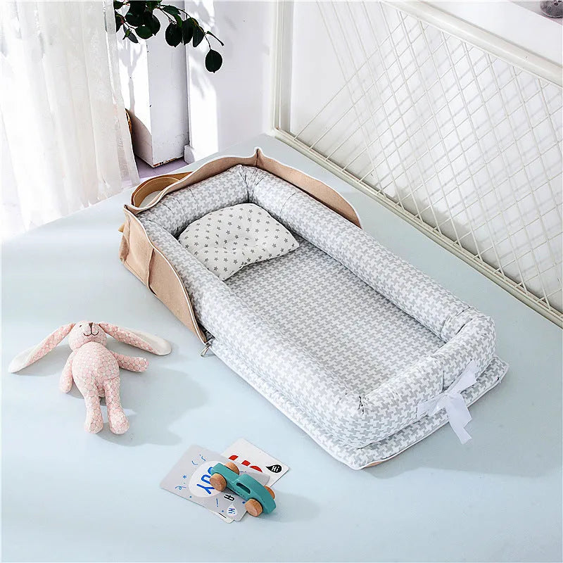 Cama de bebé plegable,