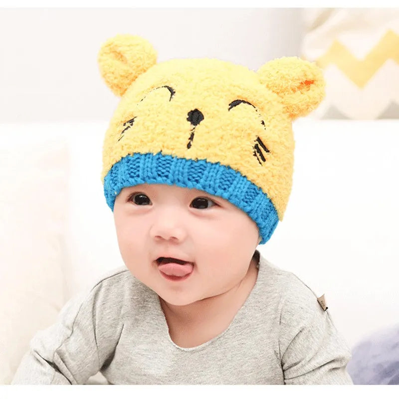 Gorro de bebé con bufanda de lana