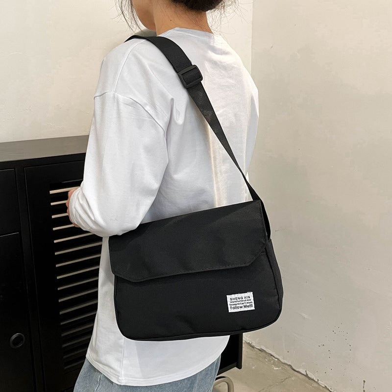Ins Messenger Bags mujeres hombres bolso de hombro tipo bandolera Casual pareja pequeño bolso con solapa