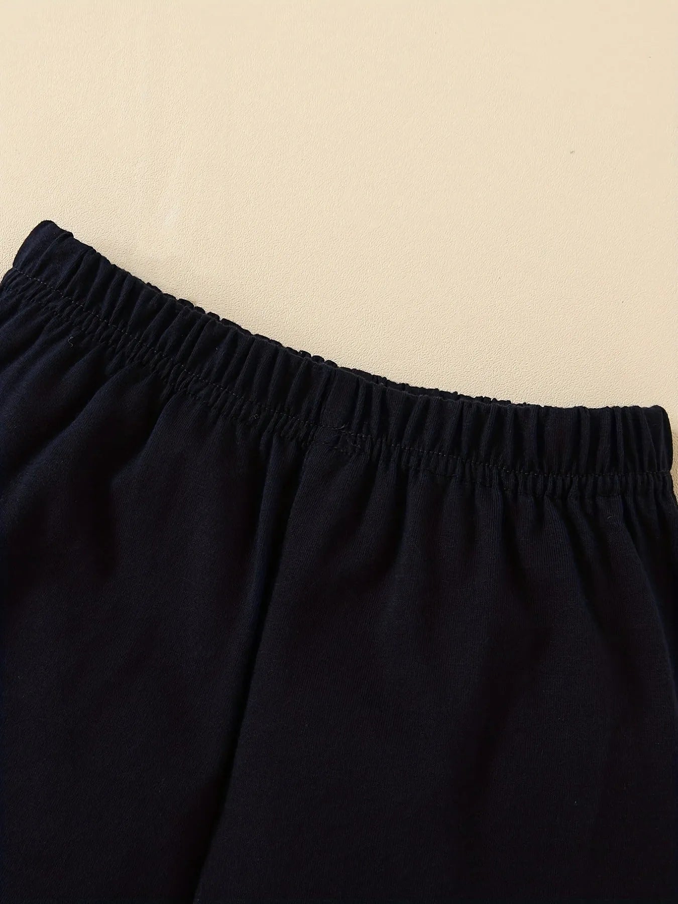 Traje de pantalones casuales sin mangas con estampado de puño y letras de moda de verano para niños