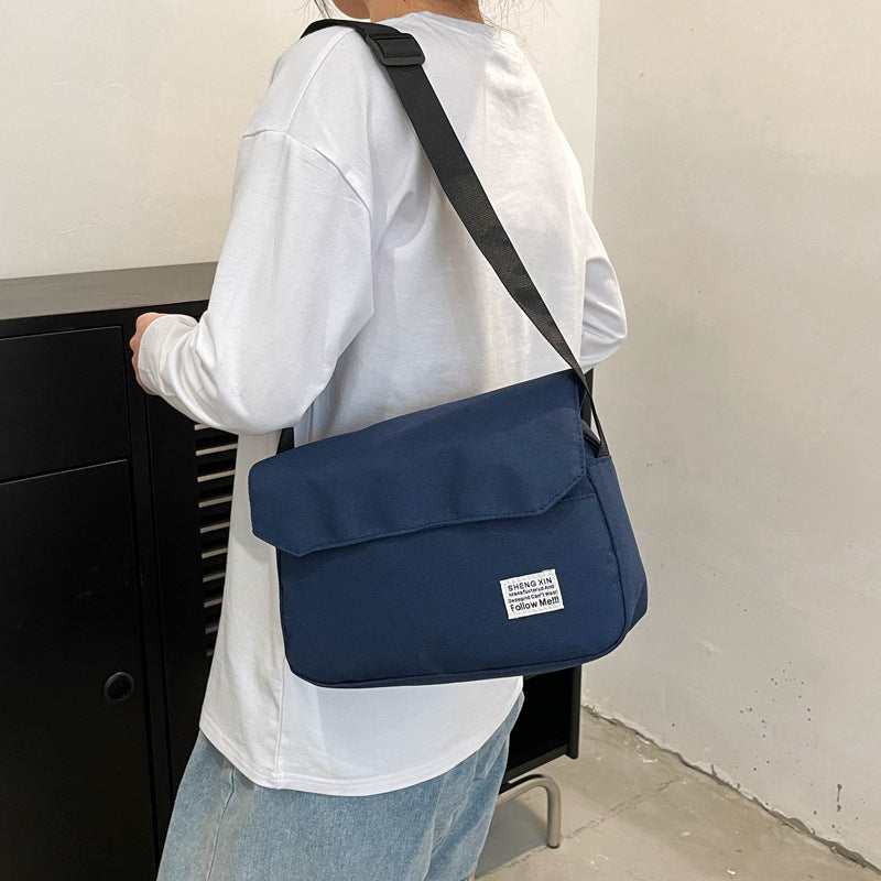 Ins Messenger Bags mujeres hombres bolso de hombro tipo bandolera Casual pareja pequeño bolso con solapa