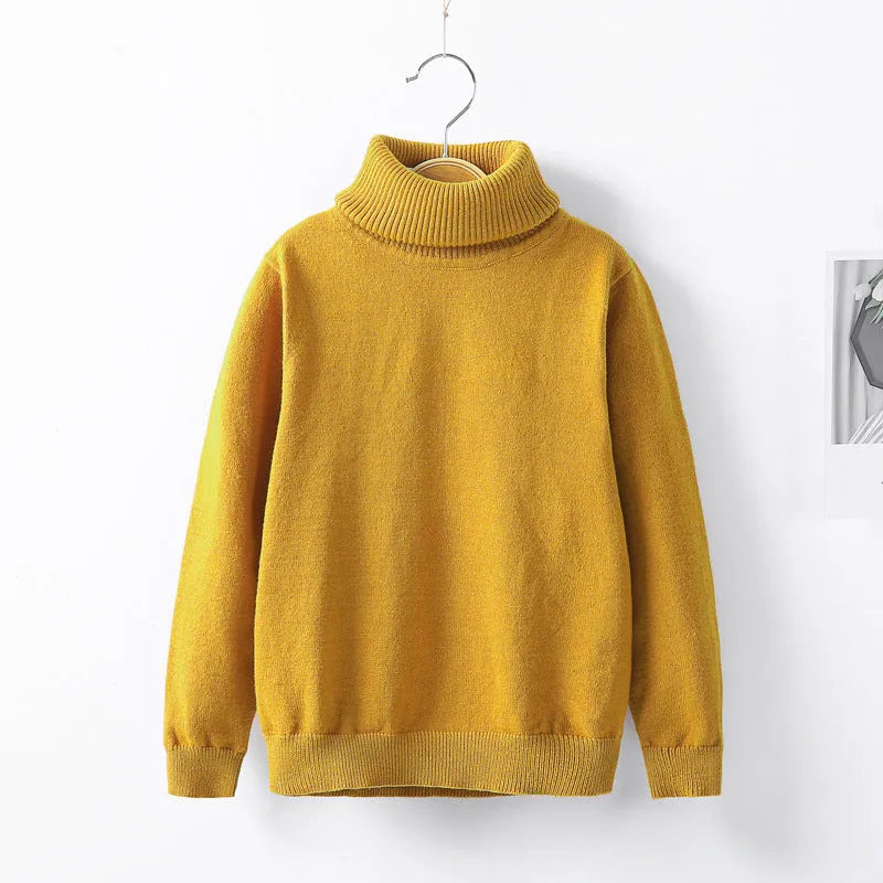 Prendas de punto infantiles de cuello alto de otoño e invierno.