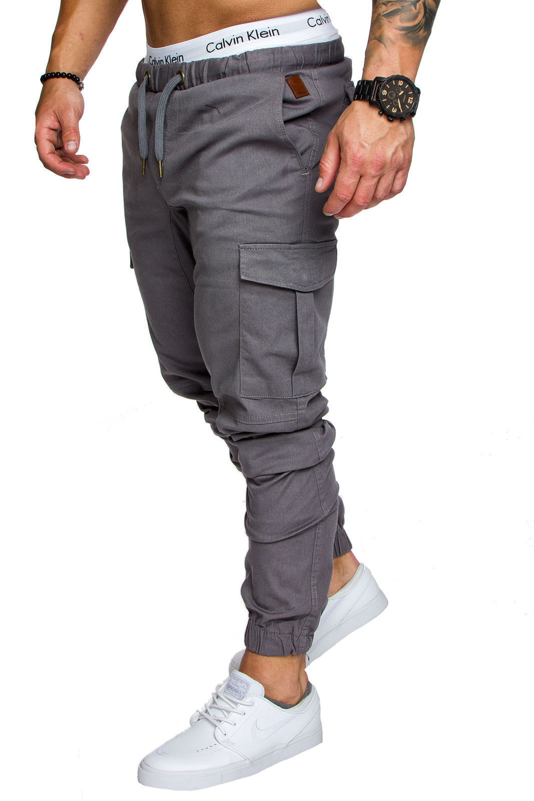 Pantalones casuales de tela tejida para hombre Pantalones de corsé