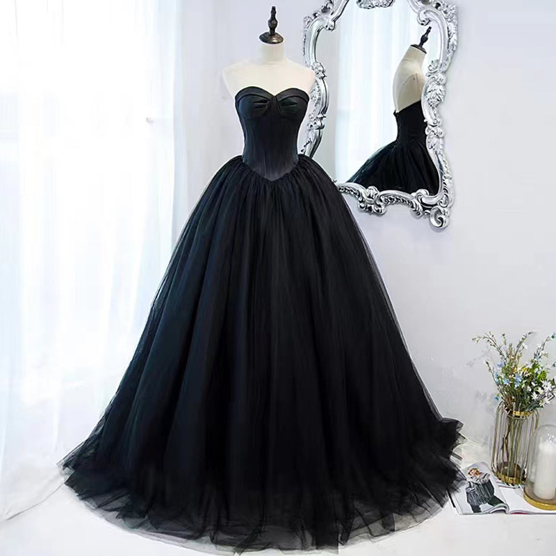 Vestido de noche negro que se puede usar como anfitrión de un cumpleaños, ligero, lujoso, de nicho, con un largo pecho.