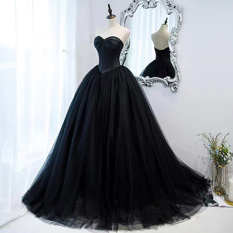 Vestido de noche negro que se puede usar como anfitrión de un cumpleaños, ligero, lujoso, de nicho, con un largo pecho.