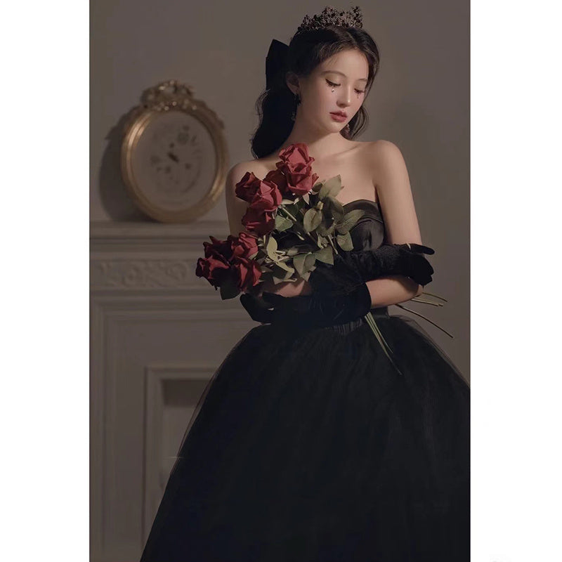 Vestido de noche negro que se puede usar como anfitrión de un cumpleaños, ligero, lujoso, de nicho, con un largo pecho.