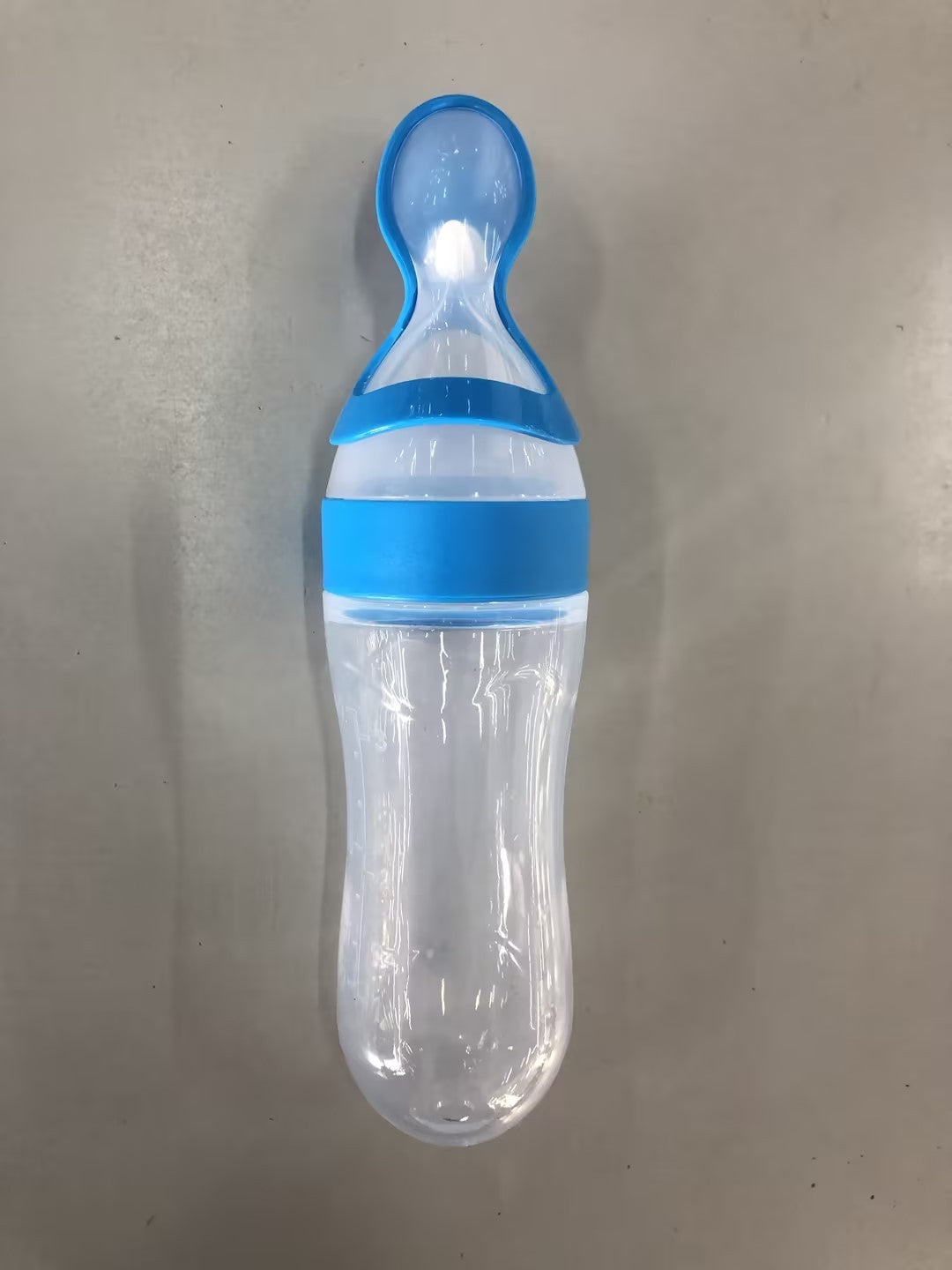 Alimentador de biberón con cuchara para bebé