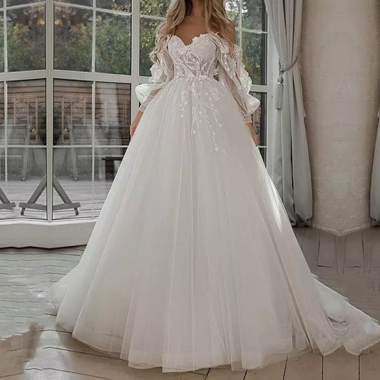 Vestidos de novia bohemios con mangas abullonadas y hombros descubiertos