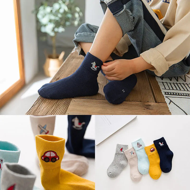 Los calcetines de los niños de los nuevos productos peinaron el arco del algodón