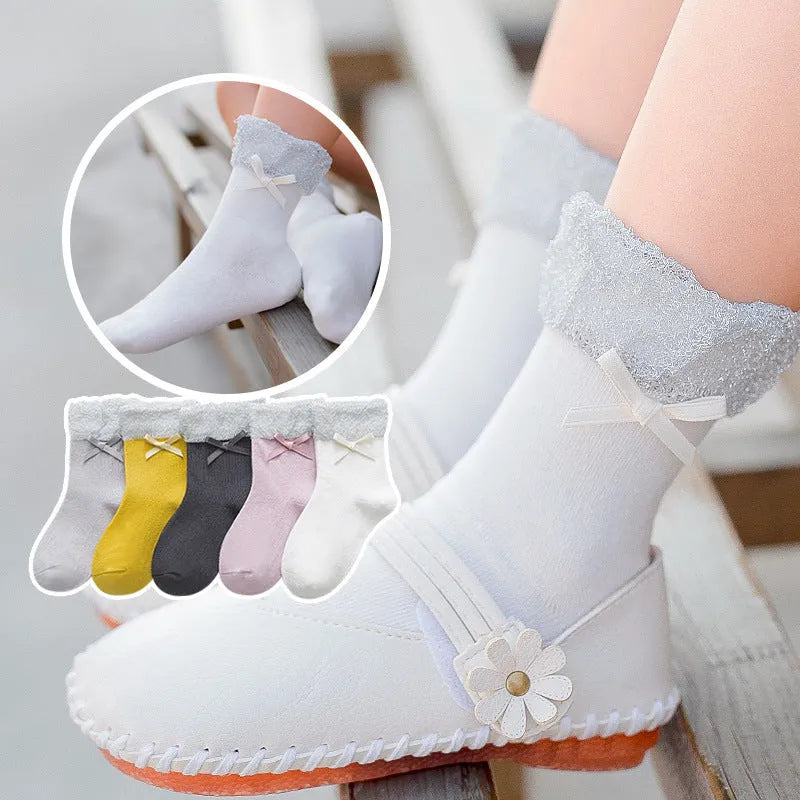 Los calcetines de los niños de los nuevos productos peinaron el arco del algodón