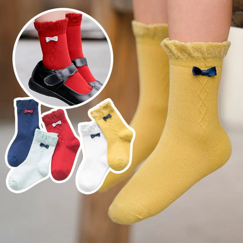Los calcetines de los niños de los nuevos productos peinaron el arco del algodón