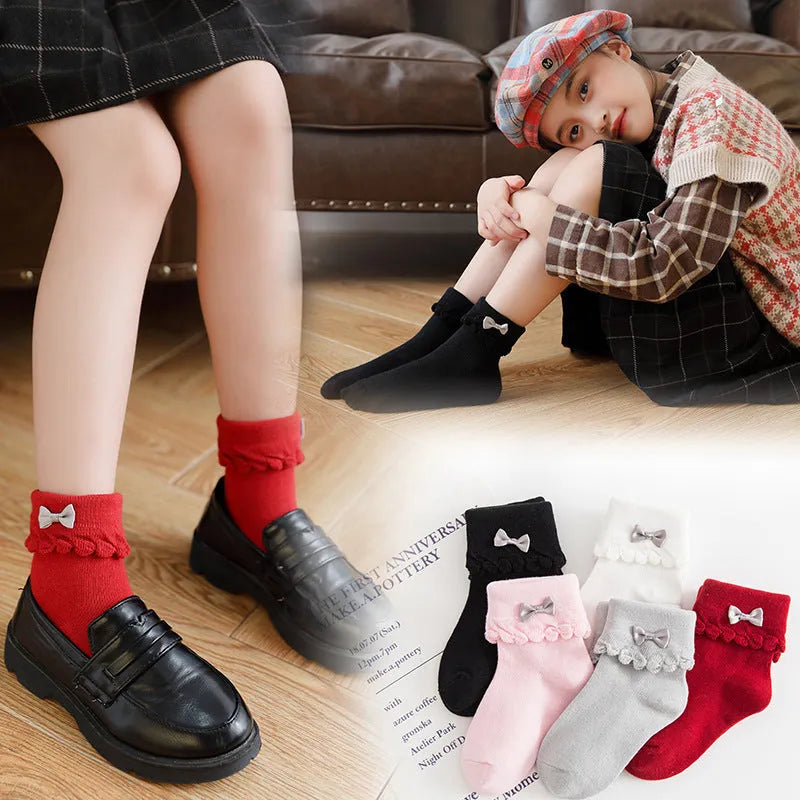 Los calcetines de los niños de los nuevos productos peinaron el arco del algodón