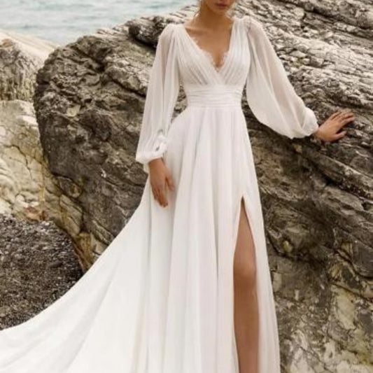 Vestido de novia europeo y americano de talle alto y talla grande con escote en V profundo, manga larga, espalda descubierta y abertura alta